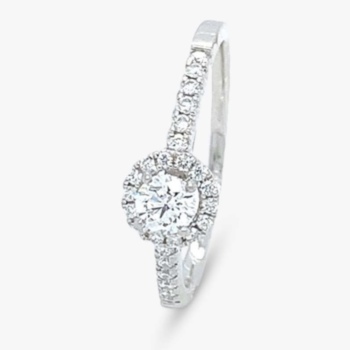  Platinum diamond cluster ring, with diamond set shoulders. Total diamond weight 0.23ct.