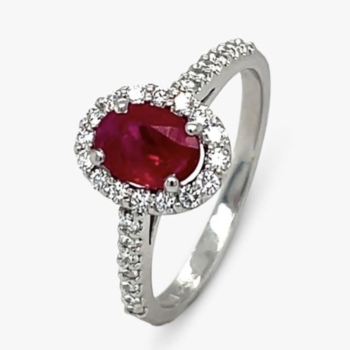 Platinum oval ruby 1.23ct and diamond 0.35ct cluster ring.