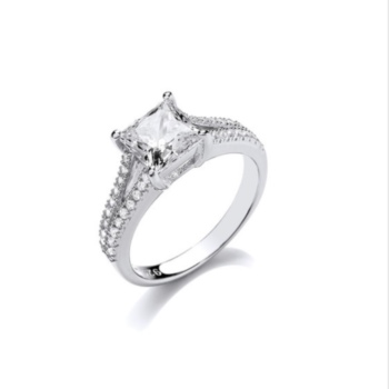 Square cut solitaire ring with split shoulders.