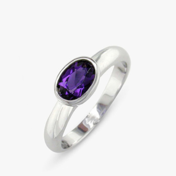 9ct white gold oval rub over set amethyst ring.