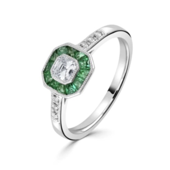 Platinum asscher cut diamond and emerald cluster ring with diamond shoulders