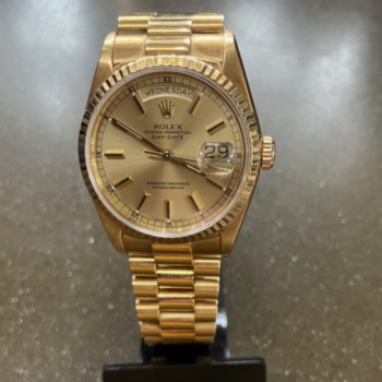 Oyster gold Rolex perpetual day date on president bracelet pre-loved. Having box & paperwork and full service history. SOLD