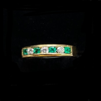 18ct yellow gold pre-loved emerald and diamond half eternity ring