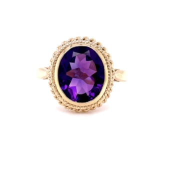 9ct yellow gold oval amethyst ring.