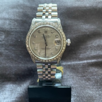 Ladies steel Rolex oyster perpetual datejust watch. Diamond bezel and diamond dot hour markers.