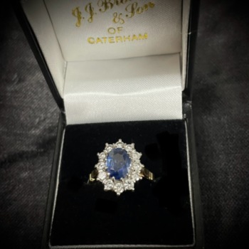 18ct yellow gold sapphire and diamond cluster ring.