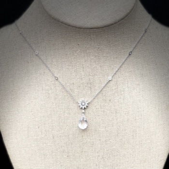 18ct white gold pear shaped White topaz and diamond pendant on diamond set chain