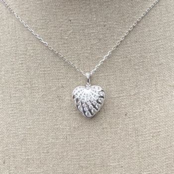 18ct white gold diamond set heart pendant and chain. Containing 1.17ct of diamonds