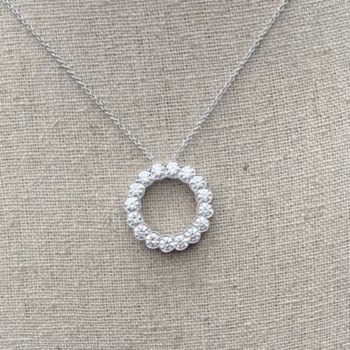 18ct white gold circular wreath diamond pendant and chain. Containing 2.31ct of diamonds
